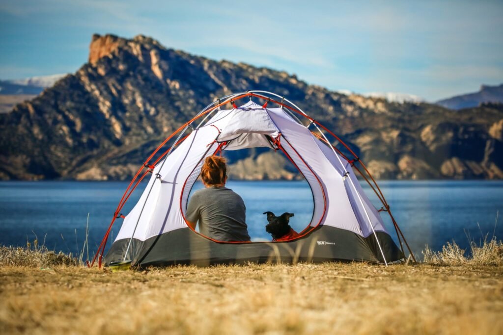Rich Solar vs SunGoldPower Kits 2026: Honest Comparison for Beginners A woman and her dog camping in Northern Nevada.